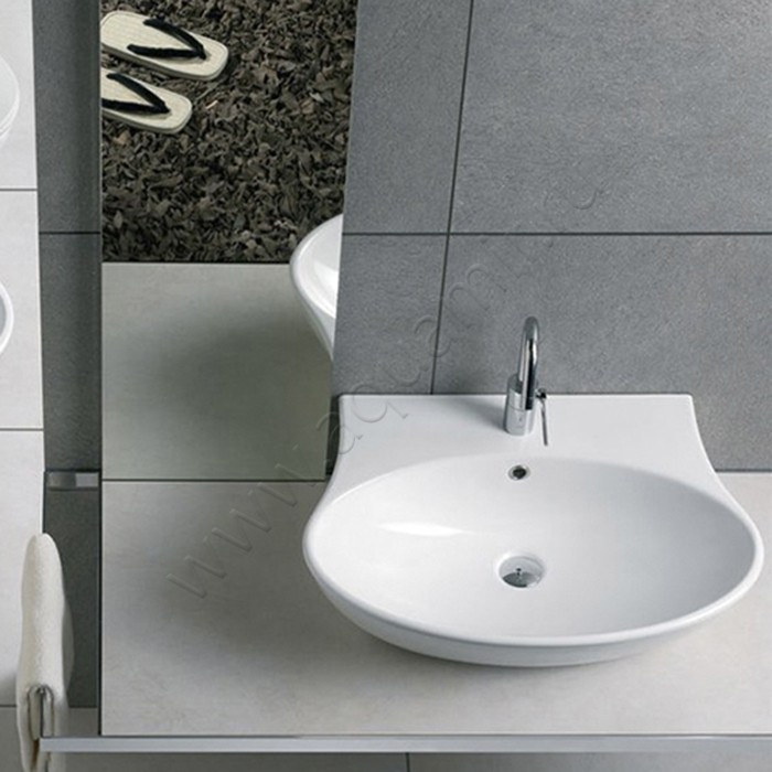 Раковина-чаша накладная с отверстием под смеситель Hatria Nido 00YXEP01 в интерьере